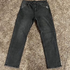 Pair of 2xl charcoal grey jeans